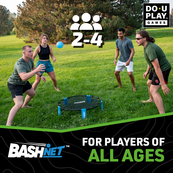 Four people playing BashNet outdoors on green grass with ball mid-air and players ready for action