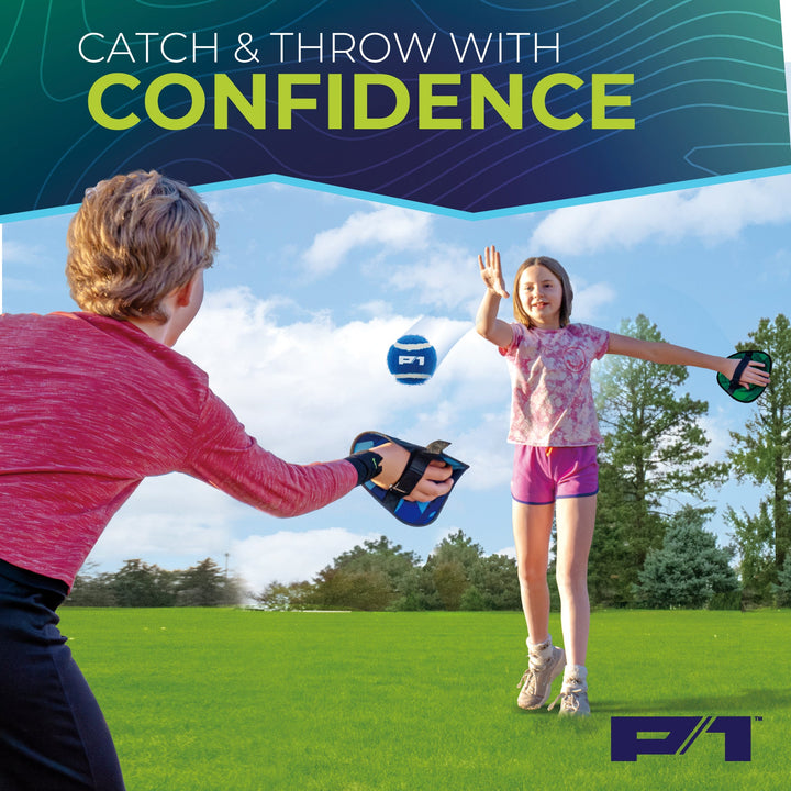 Kids playing P1 toss and catch Velcro paddle ball game outdoors
